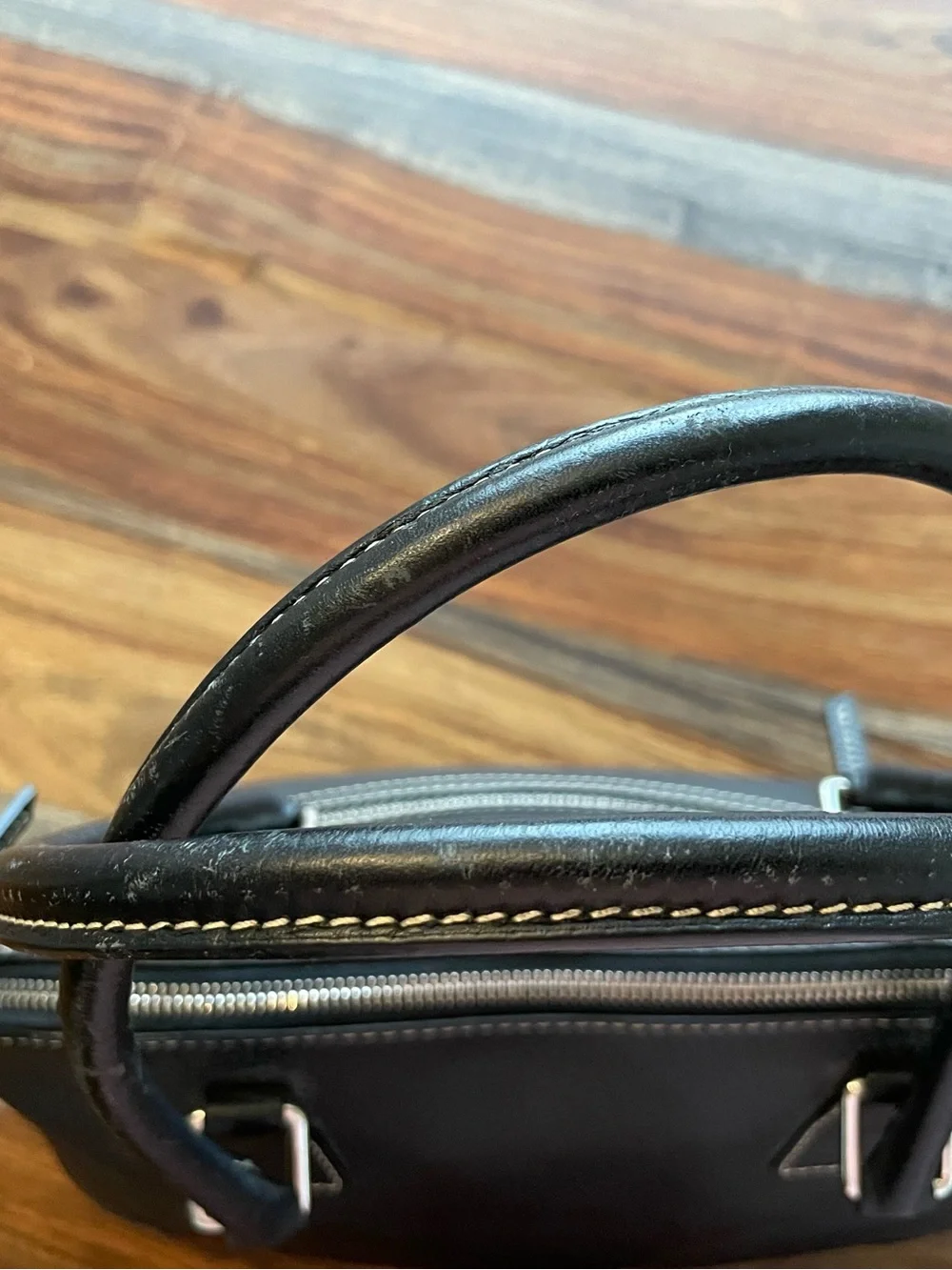 Dooney & Bourke Black Pebbled Leather Satchel with Logo Emblem